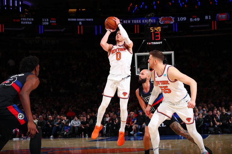 NEW YORK, NY - MARCH 25:  Donte Divincenzo #0 of the New York Knicks shoots a three point basket during the game against the Detroit Pistons on March 25, 2024 at Madison Square Garden in New York City, New York.  NOTE TO USER: User expressly acknowledges and agrees that, by downloading and or using this photograph, User is consenting to the terms and conditions of the Getty Images License Agreement. Mandatory Copyright Notice: Copyright 2024 NBAE  (Photo by David L. Nemec /NBAE via Getty Images)