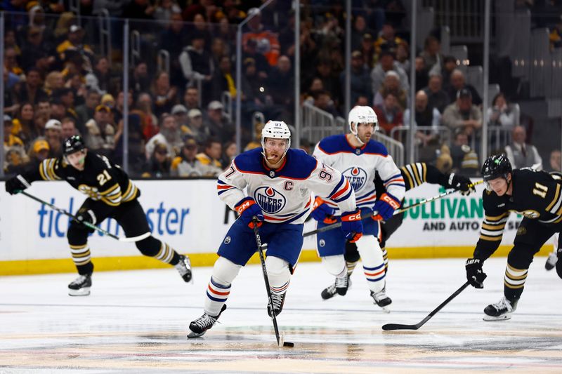 Mar 5, 2024; Boston, Massachusetts, USA; Edmonton Oilers center Connor McDavid (97) brings the puck up the ice against the Boston Bruins during the third period at TD Garden. Mandatory Credit: Winslow Townson-USA TODAY Sports