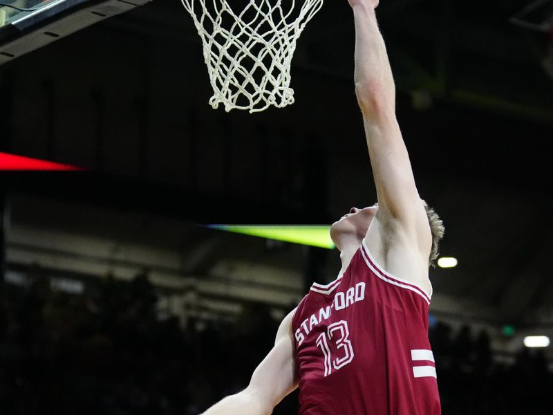 Mar 3, 2024; Boulder, Colorado, USA; Stanford Cardinal guard Michael Jones (13) finishes off a basket in the first half against the Colorado Buffaloes at the CU Events Center. Mandatory Credit: Ron Chenoy-USA TODAY Sports