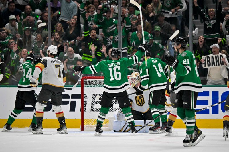 Apr 24, 2024; Dallas, Texas, USA; Dallas Stars center Roope Hintz (24) and center Joe Pavelski (16) and left wing Jamie Benn (14) and left wing Jason Robertson (21) celebrates a power play goal scored by Robertson against Vegas Golden Knights right wing Anthony Mantha (39) in the first period in game two of the first round of the 2024 Stanley Cup Playoffs at American Airlines Center. Mandatory Credit: Jerome Miron-USA TODAY Sports