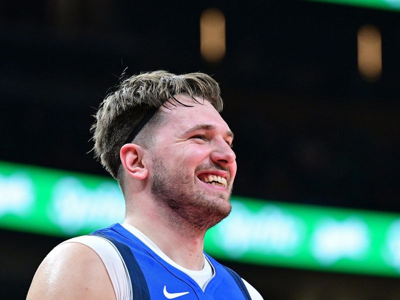 ATLANTA, GA - JANUARY 26: Luka Doncic #77 of the Dallas Mavericks smiles during the game against the Atlanta Hawks on January 26, 2024 at State Farm Arena in Atlanta, Georgia.  NOTE TO USER: User expressly acknowledges and agrees that, by downloading and/or using this Photograph, user is consenting to the terms and conditions of the Getty Images License Agreement. Mandatory Copyright Notice: Copyright 2024 NBAE (Photo by Adam Hagy/NBAE via Getty Images)