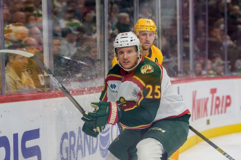 Nov 4, 2025; Saint Paul, Minnesota, USA; Minnesota Wild defenseman Jonas Brodin (25) checks Nashville Predators center Steven Stamkos (91) behind the net in the first period at Grand Casino Arena. Mandatory Credit: Matt Blewett-Imagn Images