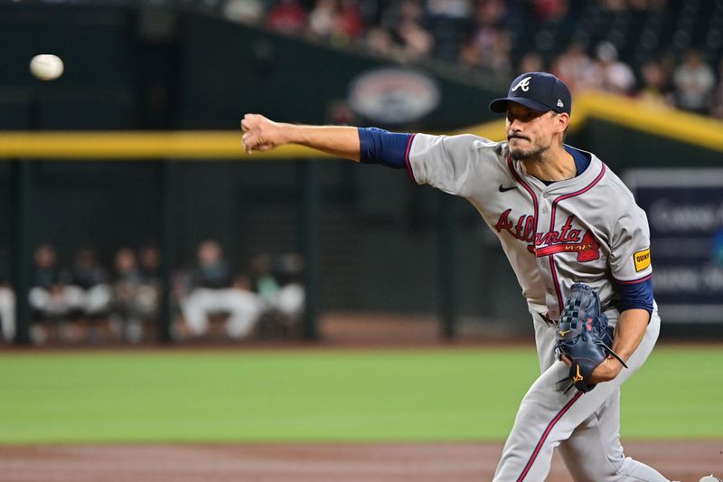 Jul 10, 2024; Phoenix, Arizona, USA;  Atlanta Braves pitcher Charlie Morton (50) throws in the first inning against the Arizona Diamondbacks at Chase Field. Mandatory Credit: Matt Kartozian-USA TODAY Sports