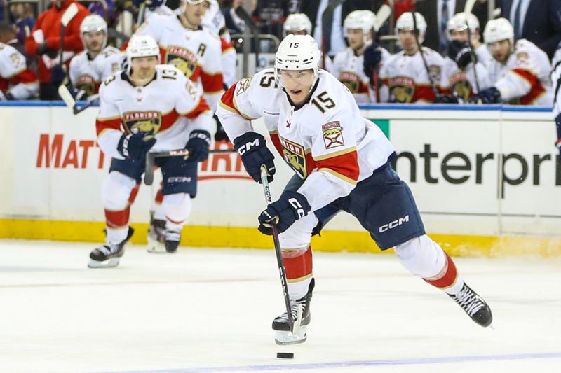 Mar 23, 2024; New York, New York, USA; Florida Panthers center Anton Lundell (15) controls the puck in the third period against the New York Rangers at Madison Square Garden. Mandatory Credit: Wendell Cruz-USA TODAY Sports