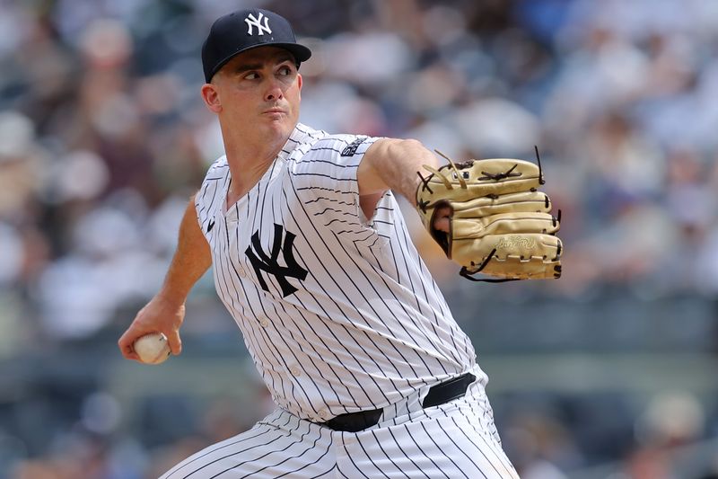 May 23, 2024; Bronx, New York, USA; New York Yankees relief pitcher Nick Burdi (57) pitches against the Seattle Mariners during the eighth inning at Yankee Stadium. Mandatory Credit: Brad Penner-USA TODAY Sports