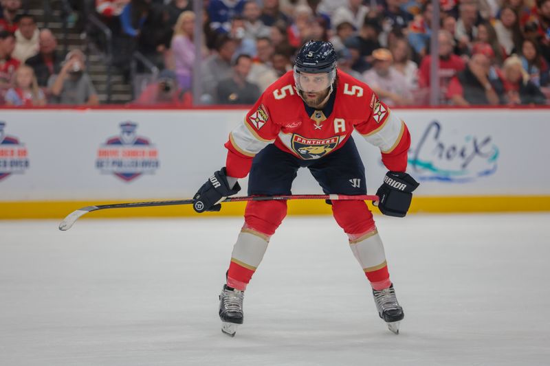 May 9, 2025; Sunrise, Florida, USA; Florida Panthers defenseman Aaron Ekblad (5) looks on against the Toronto Maple Leafs during the second period in game three of the second round of the 2025 Stanley Cup Playoffs at Amerant Bank Arena. Mandatory Credit: Sam Navarro-Imagn Images