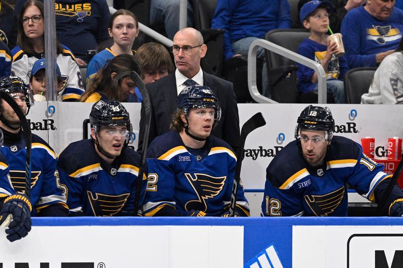 Apr 14, 2024; St. Louis, Missouri, USA; St. Louis Blues Interim Head Coach Drew Bannister looks on during the third period of a hockey game against the Seattle Kraken at Enterprise Center. Mandatory Credit: Jeff Le-USA TODAY Sports