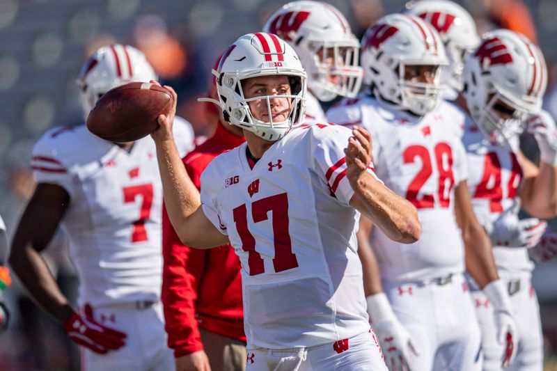 Oct 19, 2019; Champaign, IL, USA; Wisconsin Badgers quarterback Jack Coan (17) warms up prior to the first half against the Illinois Fighting Illini at Memorial Stadium. Mandatory Credit: Patrick Gorski-USA TODAY Sports