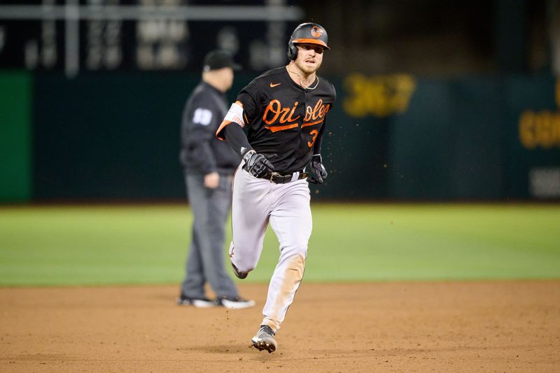 Aug 18, 2023; Oakland, California, USA; Baltimore Orioles infielder Ryan O'Hearn (32) runs to third base against the Oakland Athletics during the sixth inning at Oakland-Alameda County Coliseum. Mandatory Credit: Robert Edwards-USA TODAY Sports