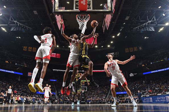 SAN FRANCISCO, CA - NOVEMBER 20: Andrew Wiggins #22 of the Golden State Warriors shoots the ball during the game against the Houston Rockets on November 20, 2023 at Chase Center in San Francisco, California. NOTE TO USER: User expressly acknowledges and agrees that, by downloading and or using this photograph, user is consenting to the terms and conditions of Getty Images License Agreement. Mandatory Copyright Notice: Copyright 2023 NBAE (Photo by Noah Graham/NBAE via Getty Images)