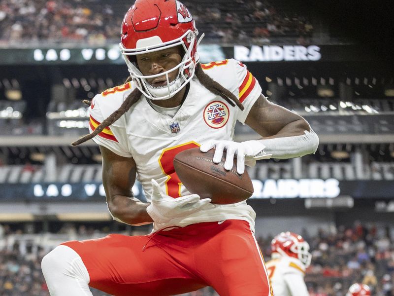 Kansas City Chiefs wide receiver Deandre Hopkins (8) warms up before playing against the Las Vegas Raiders in an NFL football game, Sunday, Oct. 27, 2024, in Las Vegas. (AP Photo/Jeff Lewis)