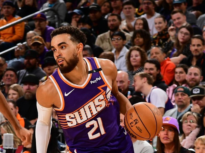 PHOENIX, AZ - NOVEMBER 2: Tyus Jones #21 of the Phoenix Suns dribbles the ball during the game against the Portland Trail Blazers on November 2, 2024 at Footprint Center in Phoenix, Arizona. NOTE TO USER: User expressly acknowledges and agrees that, by downloading and or using this photograph, user is consenting to the terms and conditions of the Getty Images License Agreement. Mandatory Copyright Notice: Copyright 2024 NBAE (Photo by Kate Frese/NBAE via Getty Images)