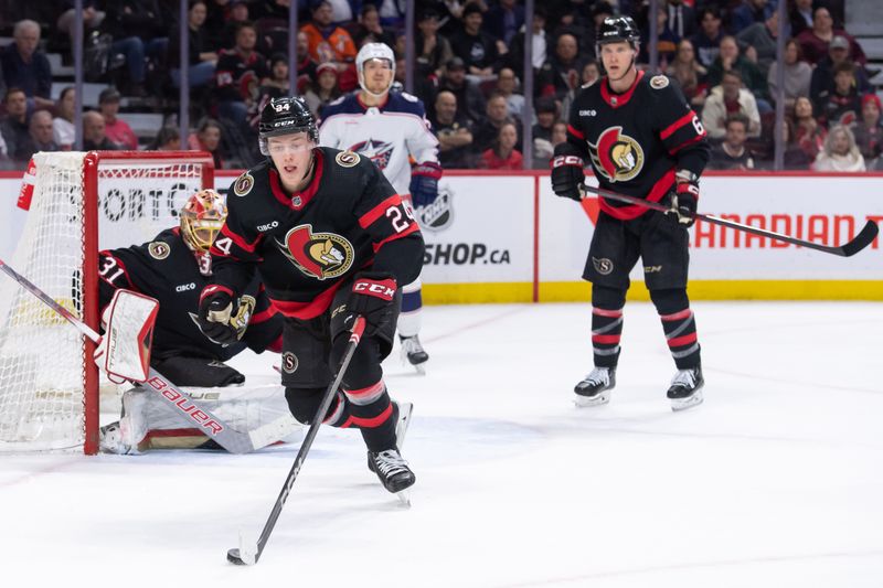 Feb 13, 2024; Ottawa, Ontario, CAN; Ottawa Senators defenseman Jacob Bernard-Docker (24) recovers the puck in the second period against the Columbus Blue Jackets at the Canadian Tire Centre. Mandatory Credit: Marc DesRosiers-USA TODAY Sports