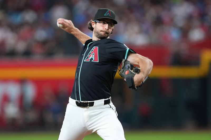 Sep 20, 2025; Phoenix, Arizona, USA; Arizona Diamondbacks pitcher Zac Gallen (23) pitches against the Philadelphia Phillies during the third inning at Chase Field. Mandatory Credit: Joe Camporeale-Imagn Images