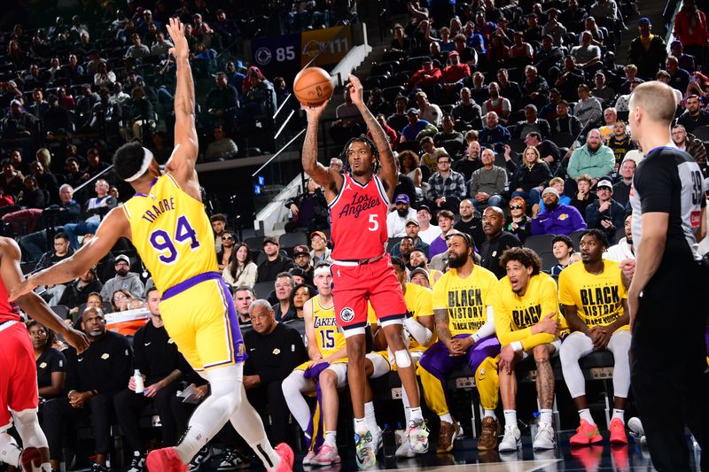 INGLEWOOD, CA - FEBRUARY 4:  Bones Hyland #5 of the LA Clippers shoots the ball during the game against the Los Angeles Lakers on February 4, 2025 at Intuit Dome in Los Angeles, California. NOTE TO USER: User expressly acknowledges and agrees that, by downloading and/or using this Photograph, user is consenting to the terms and conditions of the Getty Images License Agreement. Mandatory Copyright Notice: Copyright 2025 NBAE (Photo by Adam Pantozzi/NBAE via Getty Images)