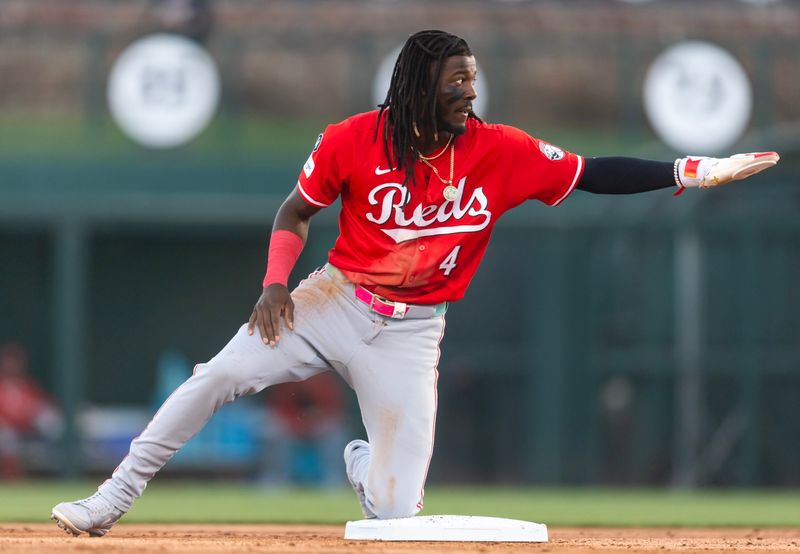 Mar 4, 2025; Phoenix, Arizona, USA; Cincinnati Reds shortstop Elly De La Cruz reacts after stealing second base against the Los Angeles Dodgers during a spring training game at Camelback Ranch-Glendale. Mandatory Credit: Mark J. Rebilas-Imagn Images