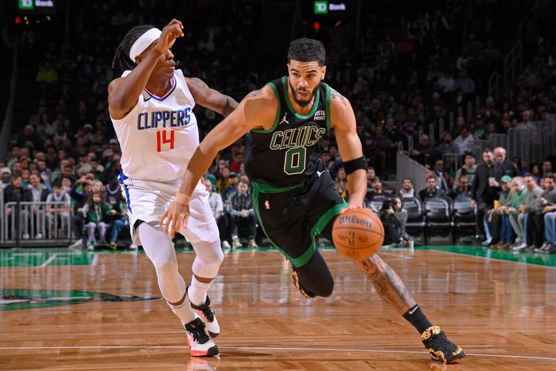 BOSTON, MA - JANUARY 27: Jayson Tatum #0 of the Boston Celtics drives to the basket during the game against the LA Clippers on January 27, 2024 at the TD Garden in Boston, Massachusetts. NOTE TO USER: User expressly acknowledges and agrees that, by downloading and or using this photograph, User is consenting to the terms and conditions of the Getty Images License Agreement. Mandatory Copyright Notice: Copyright 2024 NBAE  (Photo by Brian Babineau/NBAE via Getty Images)