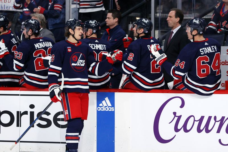 Feb 14, 2024; Winnipeg, Manitoba, CAN; Winnipeg Jets center Morgan Barron (36) celebrates his first period goal against the San Jose Sharks at Canada Life Centre. Mandatory Credit: James Carey Lauder-USA TODAY Sports
