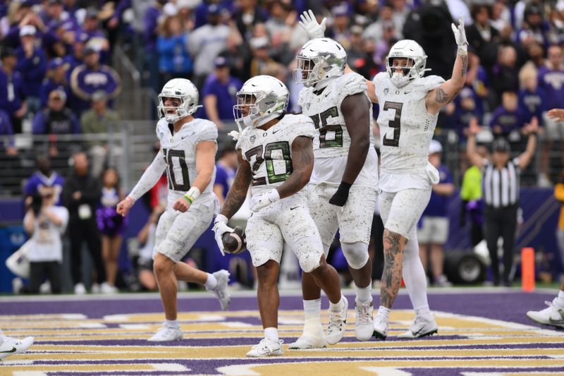 Oct 14, 2023; Seattle, Washington, USA; Oregon Ducks wide receiver Gary Bryant Jr. (2) celebrates after scoring a touchdown against the Washington Huskies during the second half at Alaska Airlines Field at Husky Stadium. Mandatory Credit: Steven Bisig-USA TODAY Sports