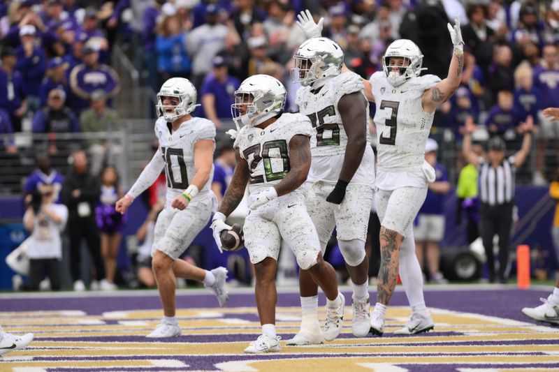 Oct 14, 2023; Seattle, Washington, USA; Oregon Ducks wide receiver Gary Bryant Jr. (2) celebrates after scoring a touchdown against the Washington Huskies during the second half at Alaska Airlines Field at Husky Stadium. Mandatory Credit: Steven Bisig-USA TODAY Sports