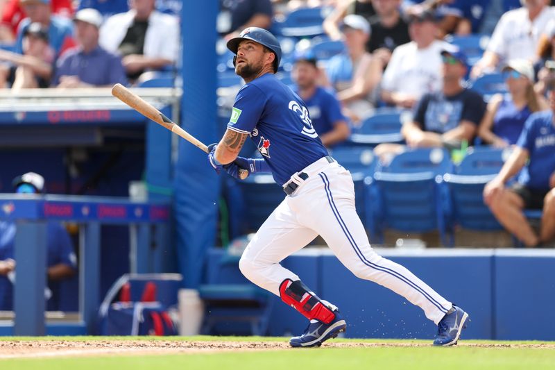 Mar 8, 2024; Dunedin, Florida, USA;  Toronto Blue Jays center fielder Nathan Lukes (38) hits a two-run rbi triple against the New York Yankees in the sixth inning at TD Ballpark. Mandatory Credit: Nathan Ray Seebeck-USA TODAY Sports