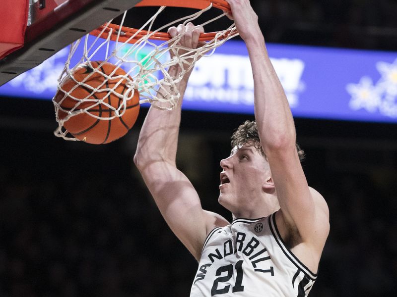 Feb 18, 2023; Nashville, Tennessee, USA;   Vanderbilt Commodores forward Liam Robbins (21) dunks against Auburn Tigers during the second half at Memorial Gymnasium.  Mandatory Credit: George Walker IV - USA TODAY Sports