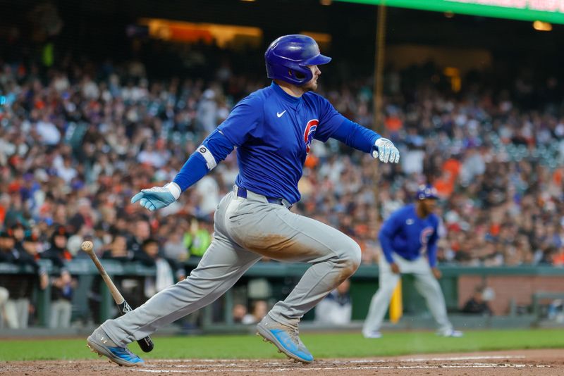 Jun 24, 2024; San Francisco, California, USA; Chicago Cubs outfielder Ian Happ (8) hits an RBI single during the fifth inning against the San Francisco Giants at Oracle Park. All Giants players wore the number 24 in honor of Giants former player Willie Mays. Mandatory Credit: Sergio Estrada-USA TODAY Sports