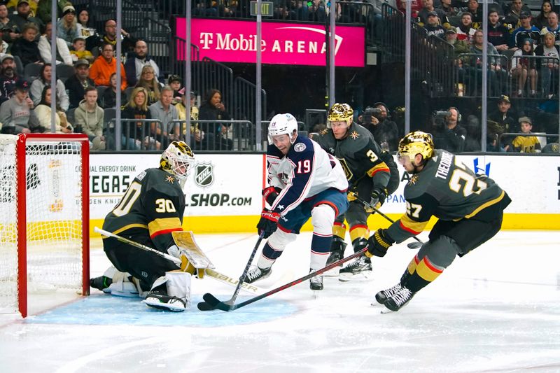 Mar 19, 2023; Las Vegas, Nevada, USA; Columbus Blue Jackets center Liam Foudy (19) attempts to score a goal against Vegas Golden Knights goaltender Jiri Patera (30) during the first period at T-Mobile Arena. Mandatory Credit: Lucas Peltier-USA TODAY Sports