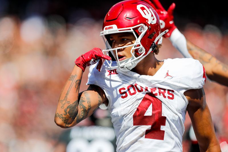 Sep 23, 2023; Cincinnati, Ohio, USA; Oklahoma Sooners wide receiver Nic Anderson (4) reacts after scoring a touchdown against the Cincinnati Bearcats in the first half at Nippert Stadium. Mandatory Credit: Katie Stratman-USA TODAY Sports