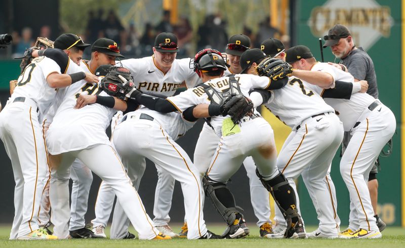 Jul 19, 2023; Pittsburgh, Pennsylvania, USA;  The Pittsburgh Pirates celebrate after defeating the Cleveland Guardians at PNC Park. The Pirates won 7-5. Mandatory Credit: Charles LeClaire-USA TODAY Sports