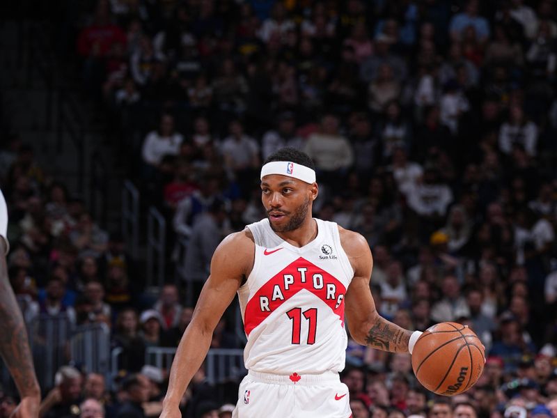 DENVER, CO - MARCH 11: Bruce Brown #11 of the Toronto Raptors dribbles the ball during the game against the Denver Nuggets on March 11, 2024 at the Ball Arena in Denver, Colorado. NOTE TO USER: User expressly acknowledges and agrees that, by downloading and/or using this Photograph, user is consenting to the terms and conditions of the Getty Images License Agreement. Mandatory Copyright Notice: Copyright 2024 NBAE (Photo by Garrett Ellwood/NBAE via Getty Images)