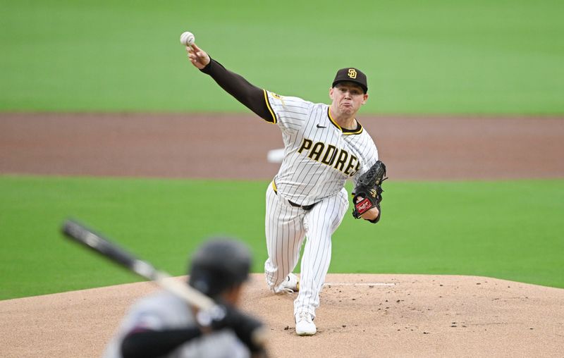May 27, 2025; San Diego, California, USA; San Diego Padres pitcher Stephen Kolek (32) delivers during the first inning against the Miami Marlins at Petco Park. Mandatory Credit: Denis Poroy-Imagn Images