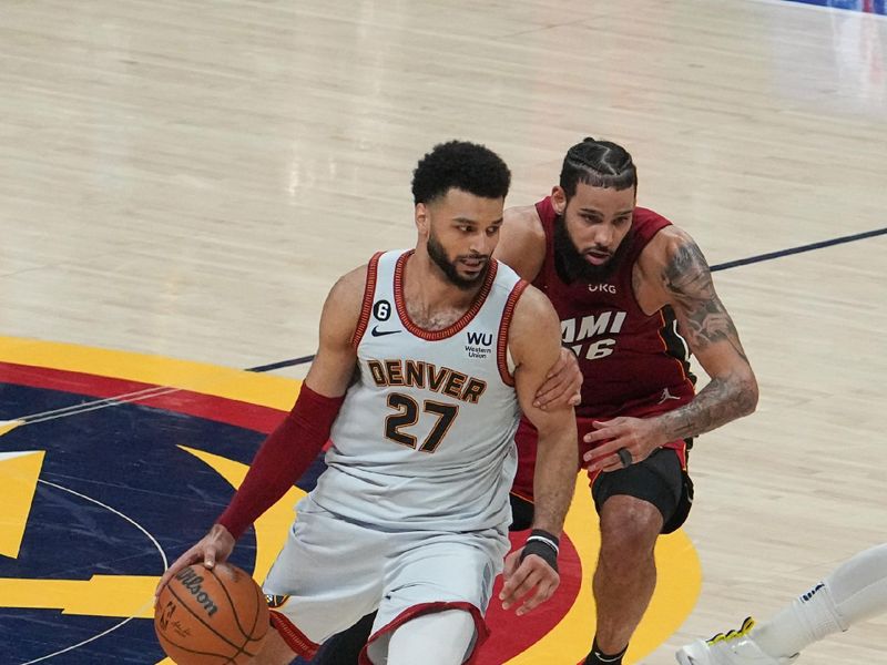 DENVER, CO - JUNE 12: Jamal Murray #27 of the Denver Nuggets goes to the basket during the game during Game Five of the 2023 NBA Finals on June 12, 2023 at the Ball Arena in Denver, Colorado. NOTE TO USER: User expressly acknowledges and agrees that, by downloading and/or using this Photograph, user is consenting to the terms and conditions of the Getty Images License Agreement. Mandatory Copyright Notice: Copyright 2023 NBAE (Photo by Bart Young/NBAE via Getty Images)