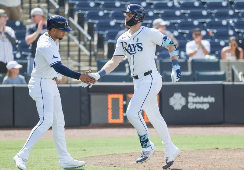 May 25, 2025; St. Petersburg, Florida, USA;  Tampa Bay Rays first base Curtis Mead (25)  is congratulated  after he hit a 2-run home run during the seventh inning against the Toronto Blue Jays at George M. Steinbrenner Field. Mandatory Credit: Kim Klement Neitzel-Imagn Images
