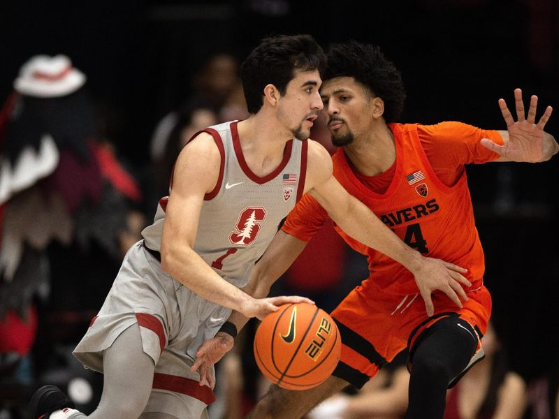 Jan 19, 2023; Stanford, California, USA; Stanford Cardinal guard Isa Silva (1) drives past Oregon State Beavers forward Jayden Stevens (14) during the first half at Maples Pavilion. Mandatory Credit: D. Ross Cameron-USA TODAY Sports