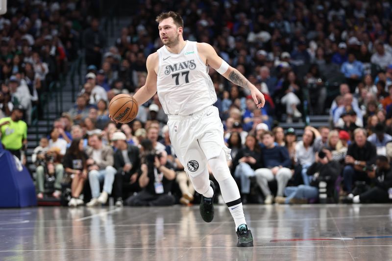 DALLAS, TX - NOVEMBER 16: Luka Doncic #77 of the Dallas Mavericks dribbles the ball during the game against the San Antonio Spurs on November 16, 2024 at American Airlines Center in Dallas, Texas. NOTE TO USER: User expressly acknowledges and agrees that, by downloading and or using this photograph, User is consenting to the terms and conditions of the Getty Images License Agreement. Mandatory Copyright Notice: Copyright 2024 NBAE (Photo by Tim Heitman/NBAE via Getty Images)