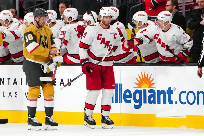 Nov 11, 2024; Las Vegas, Nevada, USA; Carolina Hurricanes center Jordan Staal (11) celebrates after scoring a goal against the Vegas Golden Knights during the second period at T-Mobile Arena. Mandatory Credit: Stephen R. Sylvanie-Imagn Images