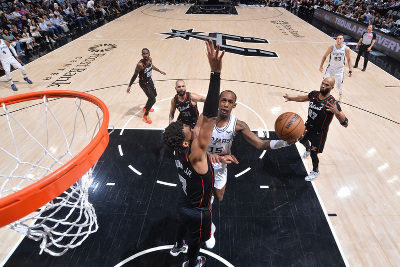 SAN ANTONIO, TX - APRIL 14: Jamaree Bouyea #15 of the San Antonio Spurs drives to the basket during the game  against the Detroit Pistons on April 14, 2024 at the Frost Bank Center in San Antonio, Texas. NOTE TO USER: User expressly acknowledges and agrees that, by downloading and or using this photograph, user is consenting to the terms and conditions of the Getty Images License Agreement. Mandatory Copyright Notice: Copyright 2024 NBAE (Photos by Michael Gonzales/NBAE via Getty Images)