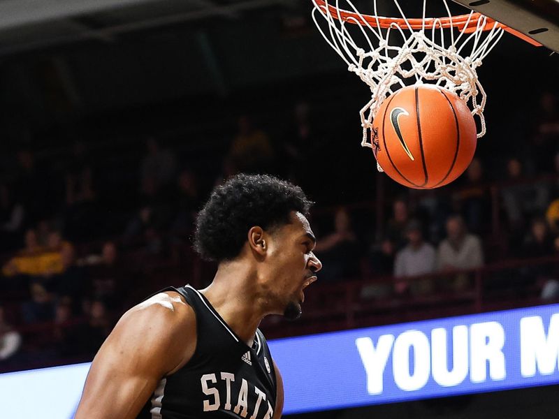 Dec 11, 2022; Minneapolis, Minnesota, USA; Mississippi State Bulldogs forward Tolu Smith (1) reacts to his shot against the Minnesota Golden Gophers during the second half at Williams Arena. Mandatory Credit: Matt Krohn-USA TODAY Sports