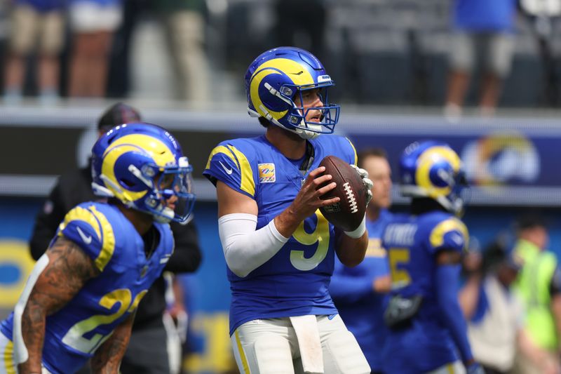 Los Angeles Rams quarterback Matthew Stafford (9) warms up before an NFL football game against the Green Bay Packers, Sunday, Oct. 6, 2024, in Inglewood, Calif. (AP Photo/Ryan Sun)