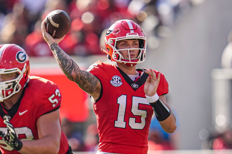 Oct 5, 2024; Athens, Georgia, USA; Georgia Bulldogs quarterback Carson Beck (15) passes against the Auburn Tigers during the first half at Sanford Stadium. Mandatory Credit: Dale Zanine-Imagn Images