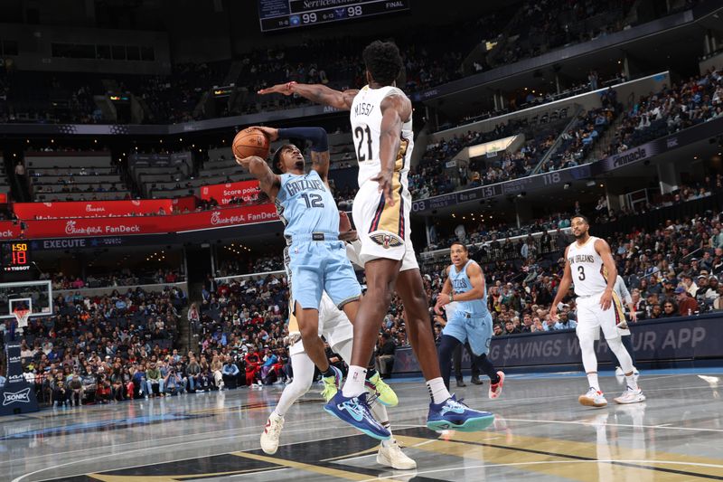 MEMPHIS, TN - NOVEMBER 29: Ja Morant #12 of the Memphis Grizzlies drives to the basket during the game against the New Orleans Pelicans during the Emirates NBA Cup game on November 29, 2024 at FedExForum in Memphis, Tennessee. NOTE TO USER: User expressly acknowledges and agrees that, by downloading and or using this photograph, User is consenting to the terms and conditions of the Getty Images License Agreement. Mandatory Copyright Notice: Copyright 2024 NBAE (Photo by Joe Murphy/NBAE via Getty Images)