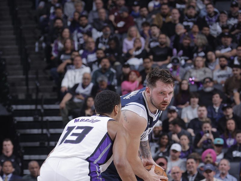 SACRAMENTO, CA - MARCH 29:  Luka Doncic #77 of the Dallas Mavericks handles the ball during the game  on March 29, 2024 at Golden 1 Center in Sacramento, California. NOTE TO USER: User expressly acknowledges and agrees that, by downloading and or using this Photograph, user is consenting to the terms and conditions of the Getty Images License Agreement. Mandatory Copyright Notice: Copyright 2024 NBAE (Photo by Rocky Widner/NBAE via Getty Images)