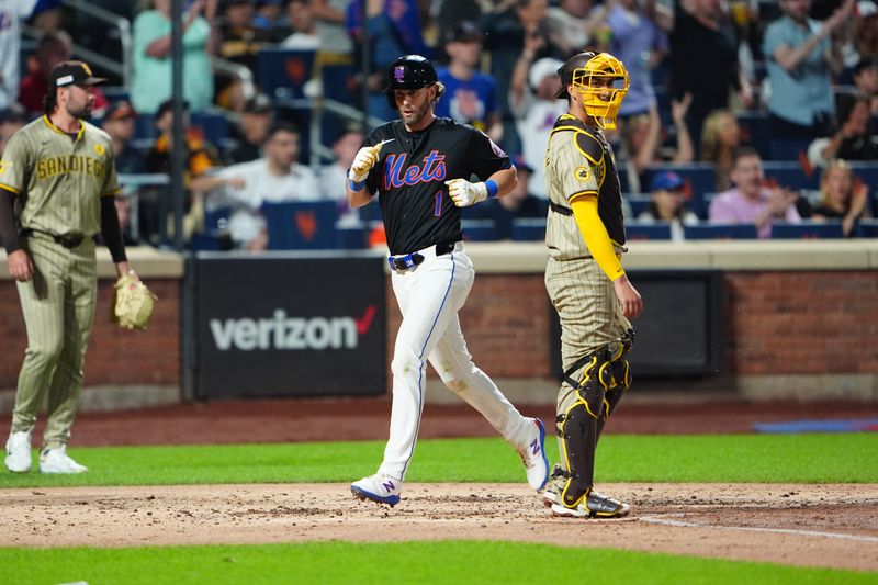 Jun 14, 2024; New York City, New York, USA; New York Mets second baseman Jeff McNeil (1) scores a run on New York Mets designated hitter JD Martinez (not pictured) RBI double against the San Diego Padres during the third inning at Citi Field. Mandatory Credit: Gregory Fisher-USA TODAY Sports