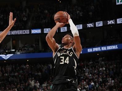 MILWAUKEE, WI - NOVEMBER 18: Giannis Antetokounmpo #34 of the Milwaukee Bucks shoots the ball during the game against the Dallas Mavericks on November 18, 2023 at the Fiserv Forum Center in Milwaukee, Wisconsin. NOTE TO USER: User expressly acknowledges and agrees that, by downloading and or using this Photograph, user is consenting to the terms and conditions of the Getty Images License Agreement. Mandatory Copyright Notice: Copyright 2023 NBAE (Photo by Gary Dineen/NBAE via Getty Images).