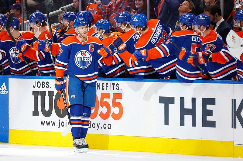 Dec 8, 2023; Edmonton, Alberta, CAN; Edmonton Oilers forward Connor McDavid (97) celebrates after scoring a goal against the Minnesota Wild during the second period at Rogers Place. Mandatory Credit: Perry Nelson-USA TODAY Sports.