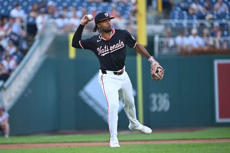 Aug 27, 2024; Washington, District of Columbia, USA; Washington Nationals third baseman Jose Tena (8) throws to first base after fielding a grand ball against the New York Yankees during the first inning at Nationals Park. Mandatory Credit: Rafael Suanes-USA TODAY Sports