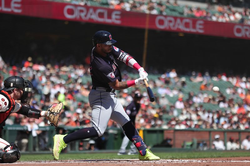 Sep 13, 2023; San Francisco, California, USA; Cleveland Guardians right fielder Gabriel Arias (13) reaches base on an throwing error during the first inning against the San Francisco Giants at Oracle Park. Mandatory Credit: Sergio Estrada-USA TODAY Sports