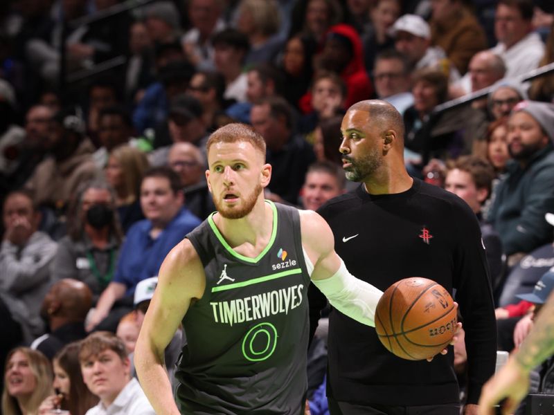 MINNEAPOLIS, MN -  NOVEMBER 26: Donte DiVincenzo #0 of the Minnesota Timberwolves dribbles the ball during the game against the Houston Rockets during the Emirates NBA Cup game on November 26, 2024 at Target Center in Minneapolis, Minnesota. NOTE TO USER: User expressly acknowledges and agrees that, by downloading and or using this Photograph, user is consenting to the terms and conditions of the Getty Images License Agreement. Mandatory Copyright Notice: Copyright 2024 NBAE (Photo by David Sherman/NBAE via Getty Images)