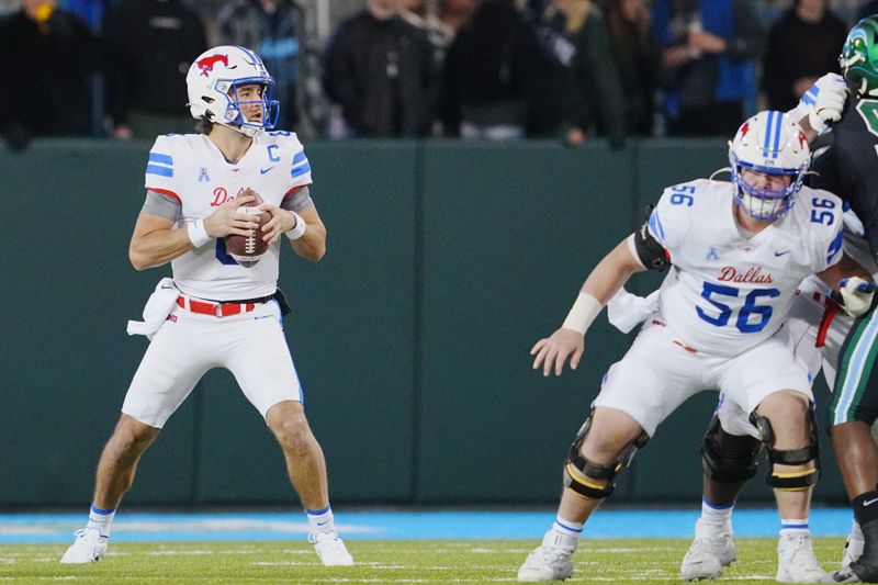 Nov 17, 2022; New Orleans, Louisiana, USA; Southern Methodist Mustangs quarterback Kevin Jennings looks to pass against the Tulane Green Wave during the first half at Yulman Stadium. Mandatory Credit: Andrew Wevers-USA TODAY Sports